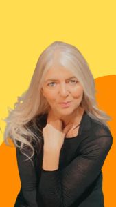 A photo of Tracy Brooks, a white woman with long blond hair