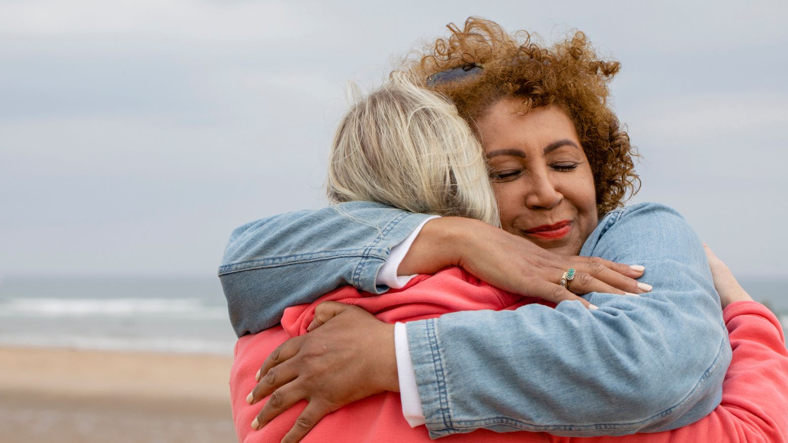 Two woman hugging