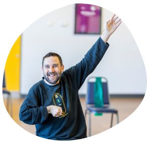 A man doing a seated exercise