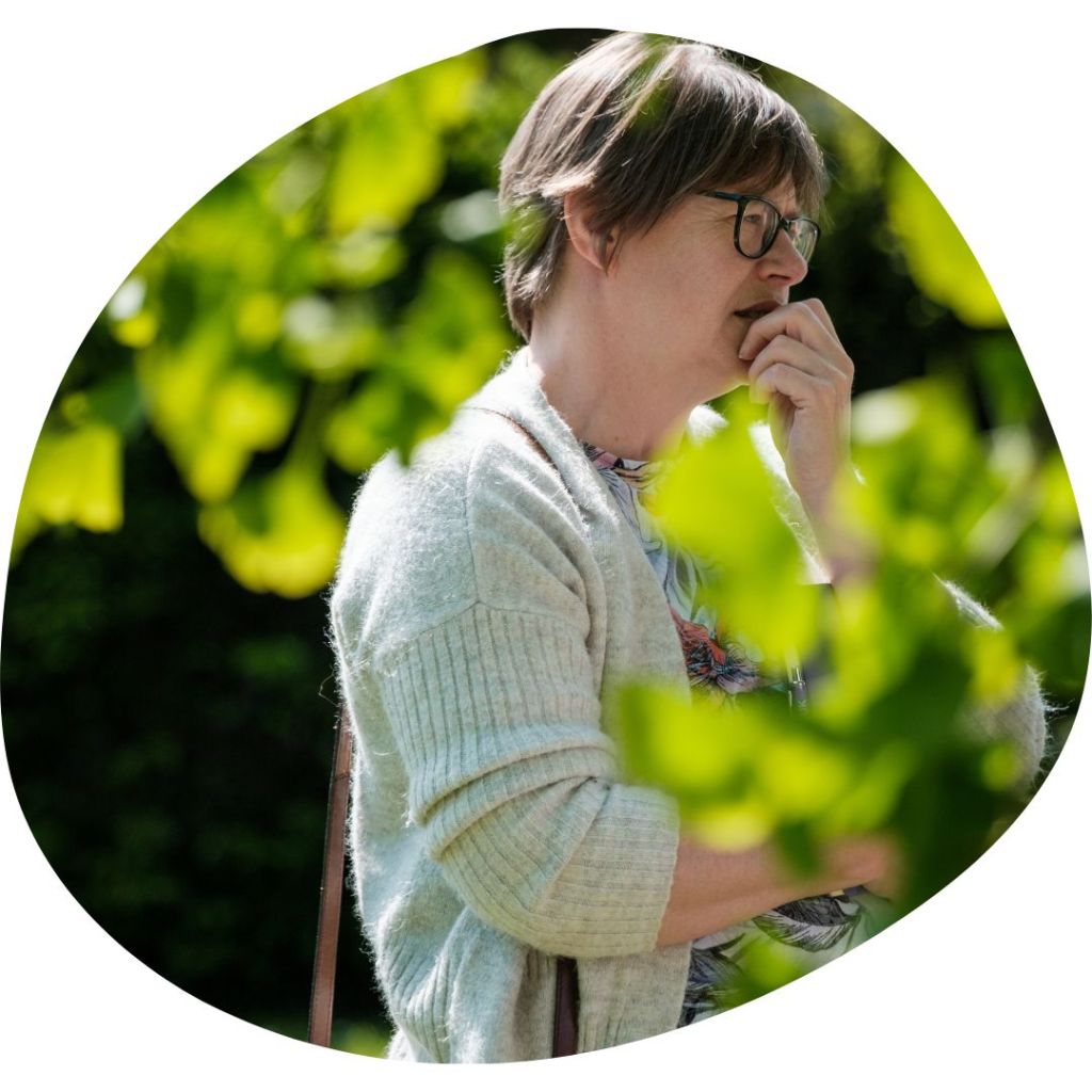 A woman standing in our gardens at our centre