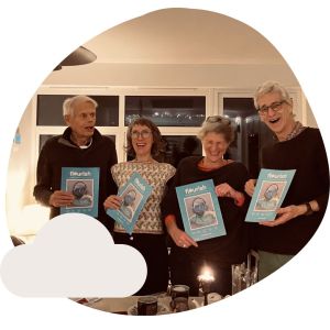 Philip and friends holding copies of Flourish magazine.