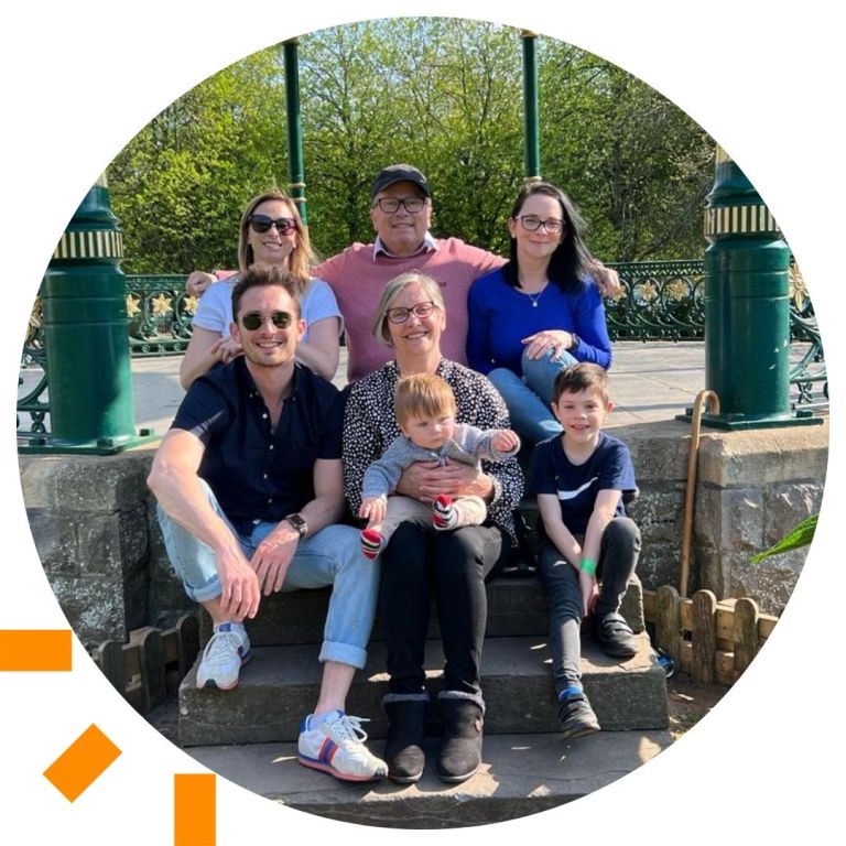 A picture of Paul and his grandchildren