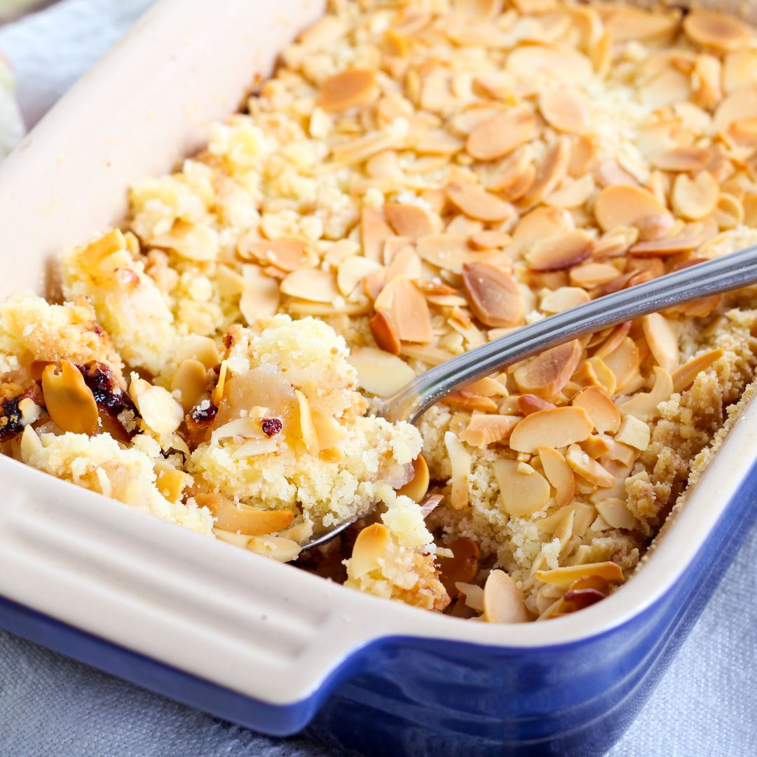 An oven dish filled with crumble cake