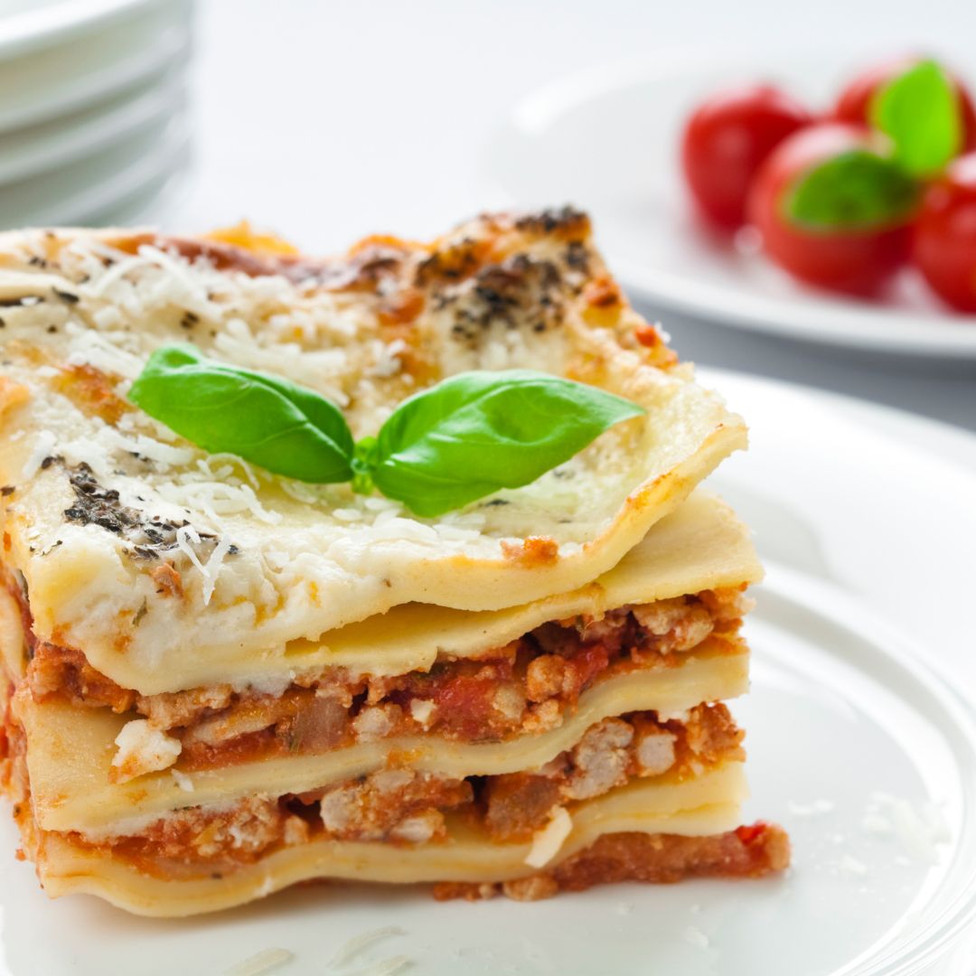 A slice of lasagne on a plate