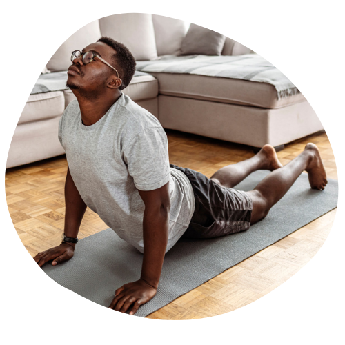 Photo of a young man doing yoga.