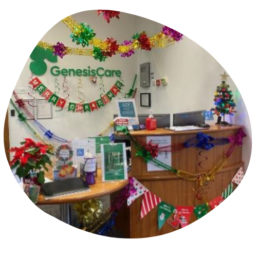 Photo of a desk at GenesisCare covered in Christmas decorations.