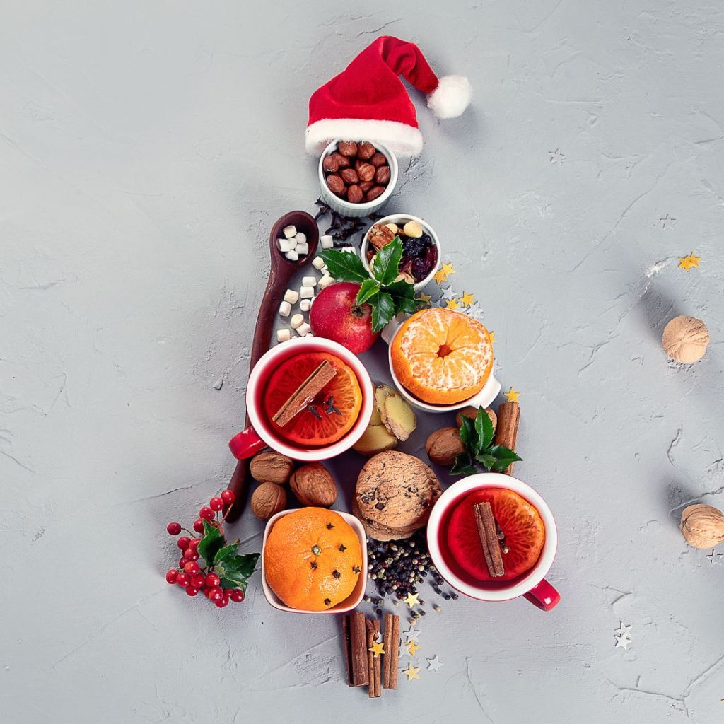 A Christmas tree made out of fruit